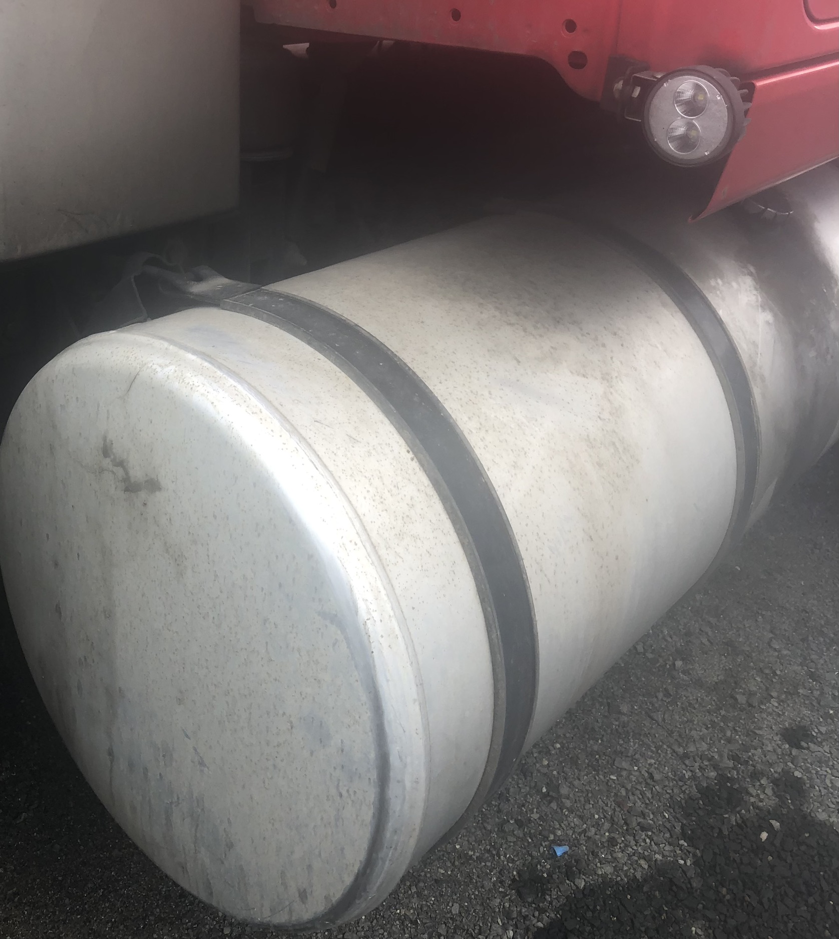 Close-up of dull, dirty fuel tank before polishing
